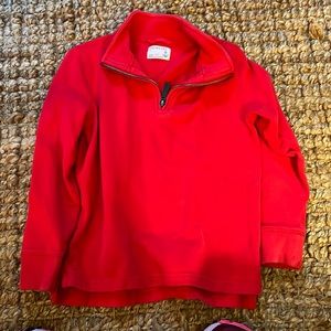 Red pull over in excellent condition